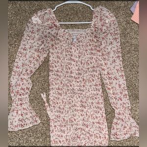 super stretchy floral bodycon dress from princess polly with puffy mesh sleeves